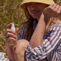 Golden Hour DEET-Free Repellent -Beauty Essence Shop 2 Kinfield Golden Hour Applying