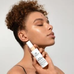 SPF 50 Flex-Perfecting™ Mineral Drops Tinted Sunscreen -Beauty Essence Shop SPF50Tinted model 02 lifestyle2